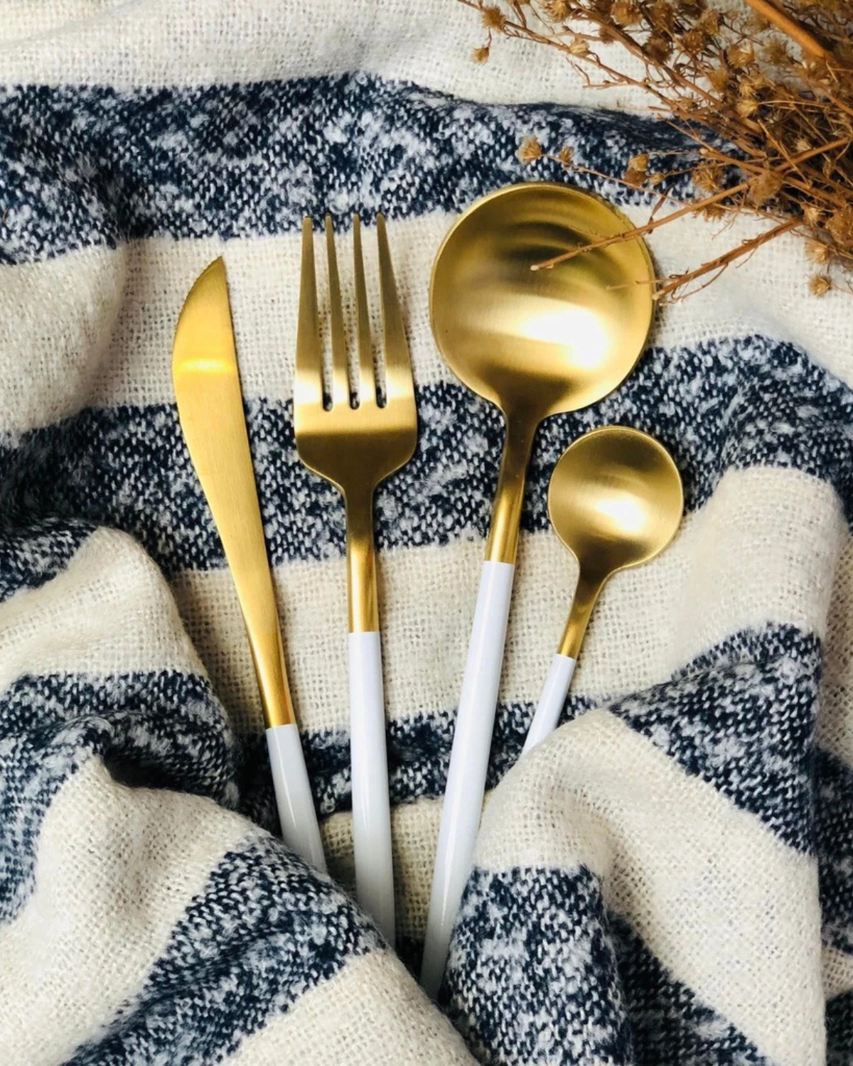 Stainless Steel Cutlery Set with Gold Accents and Matte Black Handles