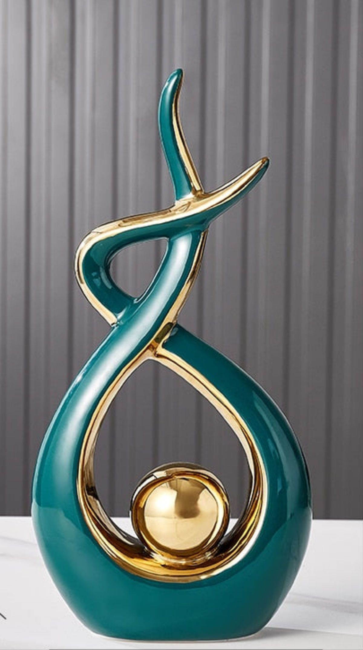 Abstract Ceramic Sculpture with Gold Accents and Modern Design