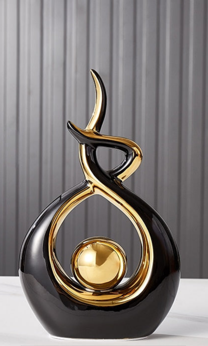 Abstract Ceramic Sculpture with Gold Accents and Modern Design