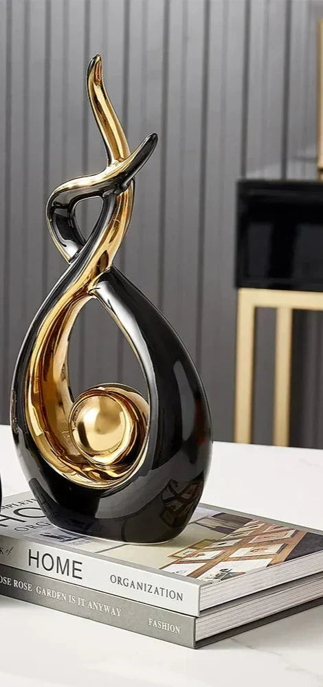 Abstract Ceramic Sculpture with Gold Accents and Modern Design