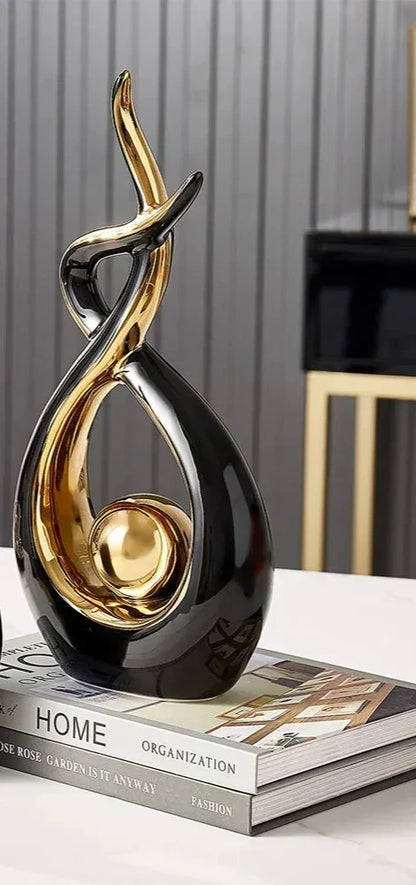 Abstract Ceramic Sculpture with Gold Accents and Modern Design