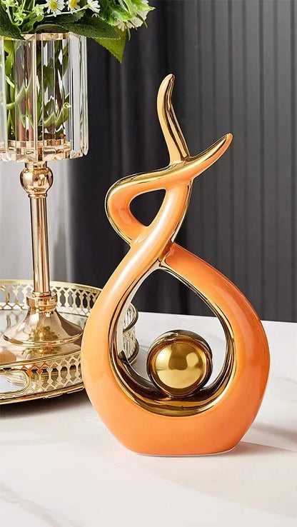 Abstract Ceramic Sculpture with Gold Accents and Modern Design