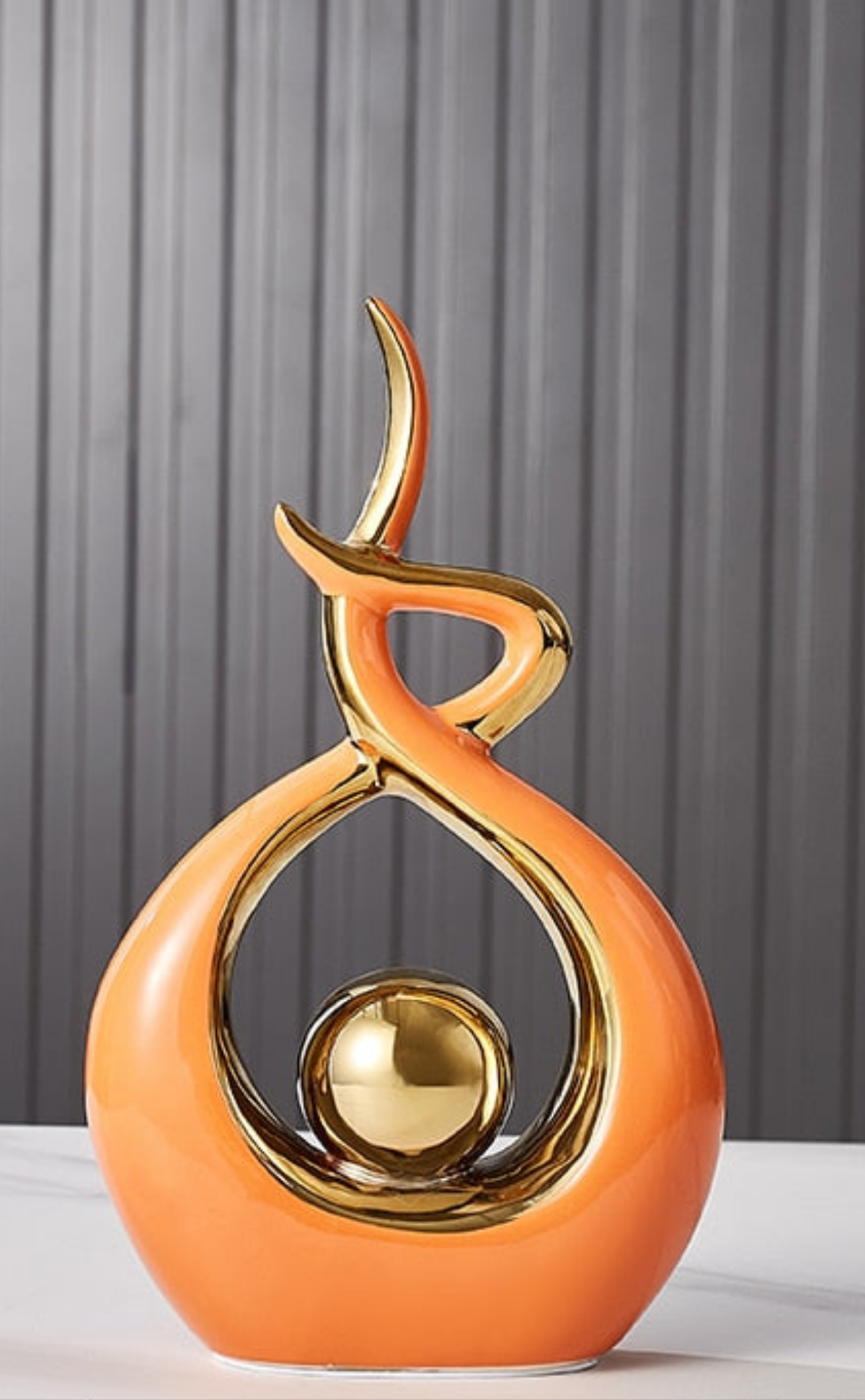 Abstract Ceramic Sculpture with Gold Accents and Modern Design