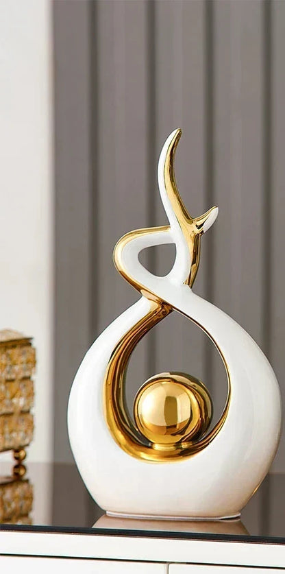 Abstract Ceramic Sculpture with Gold Accents and Modern Design
