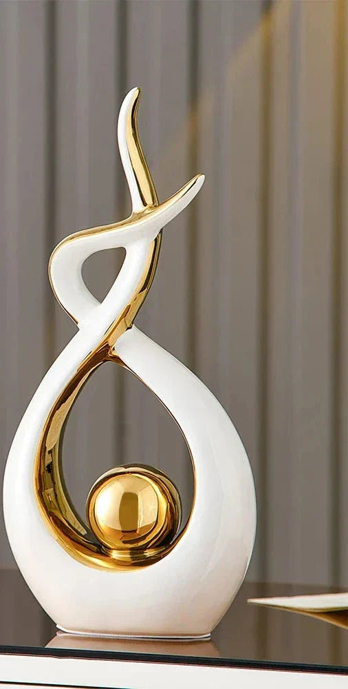 Abstract Ceramic Sculpture with Gold Accents and Modern Design