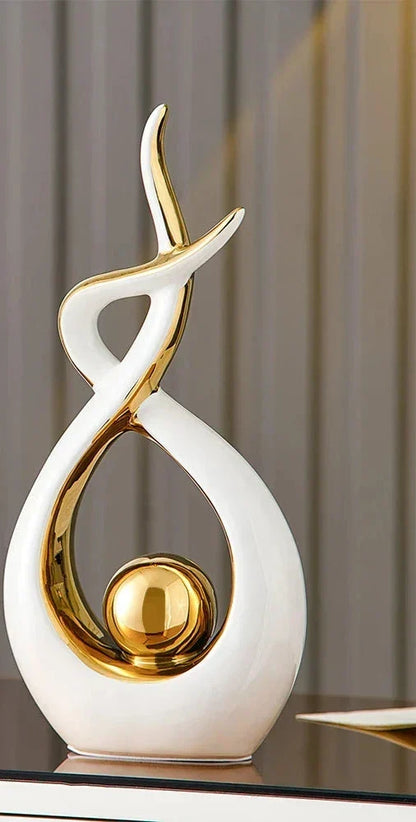 Abstract Ceramic Sculpture with Gold Accents and Modern Design
