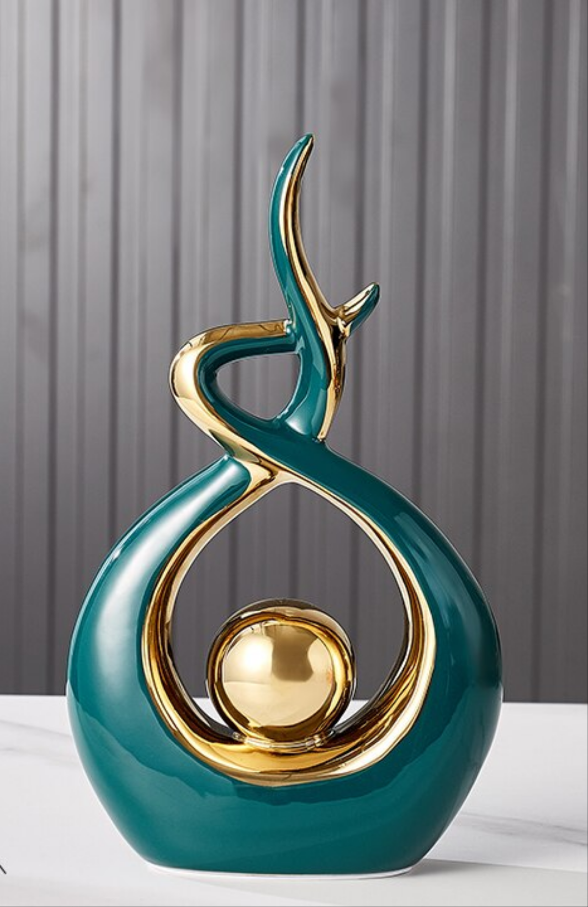 Abstract Ceramic Sculpture with Gold Accents and Modern Design