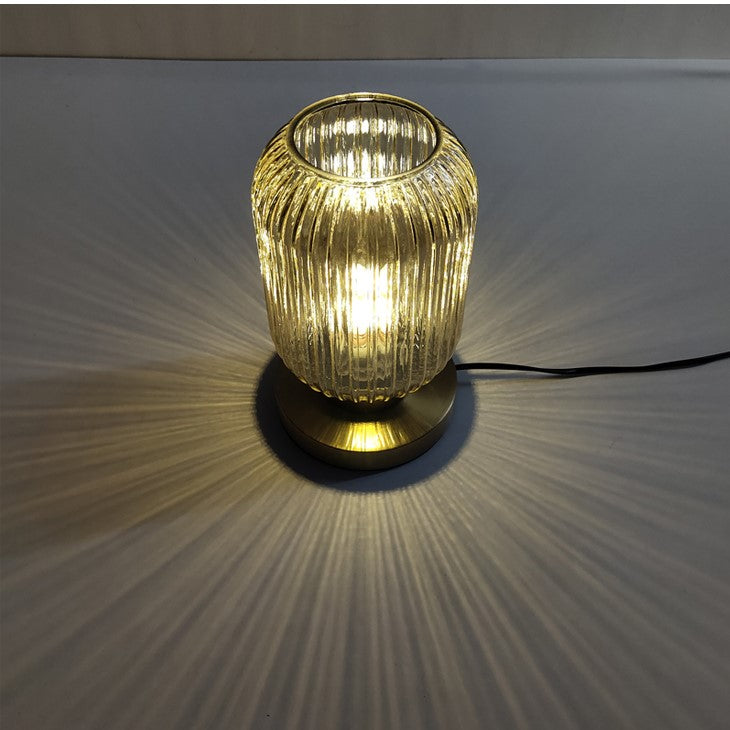 Amber Glass Table Lamp with Minimalist Metal Frame and Warm Ambient Light