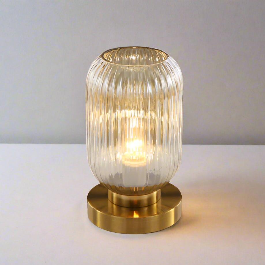 Amber Glass Table Lamp with Minimalist Metal Frame and Warm Ambient Light