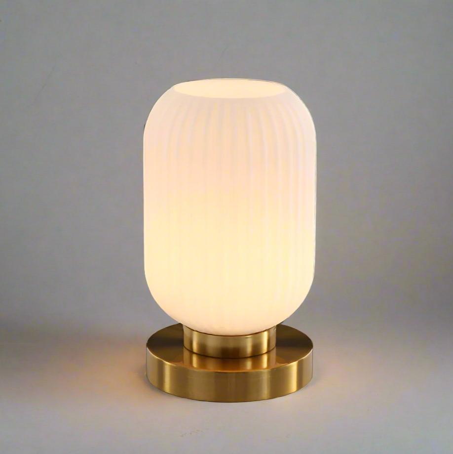 Amber Glass Table Lamp with Minimalist Metal Frame and Warm Ambient Light