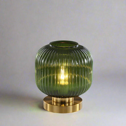 Amber Glass Table Lamp with Minimalist Metal Frame and Warm Ambient Light