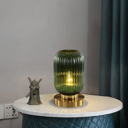 Amber Glass Table Lamp with Minimalist Metal Frame and Warm Ambient Light