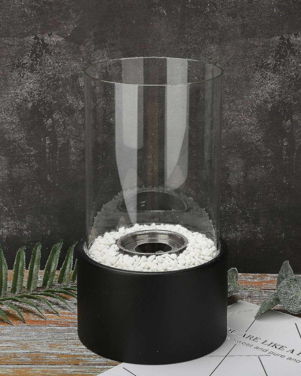 Elegant Metal and Glass Oil Lamp with Open Flame and Decorative Stones