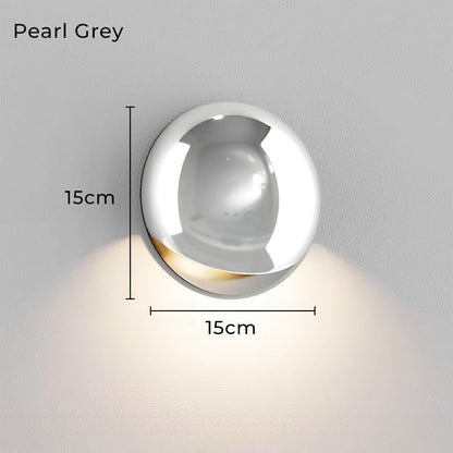 Minimalist Pebble-Inspired LED Wall Lamp with Warm White Light