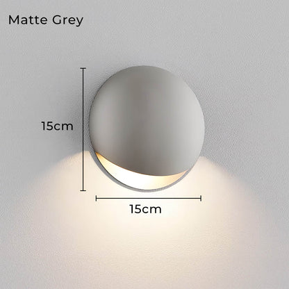 Minimalist Pebble-Inspired LED Wall Lamp with Warm White Light