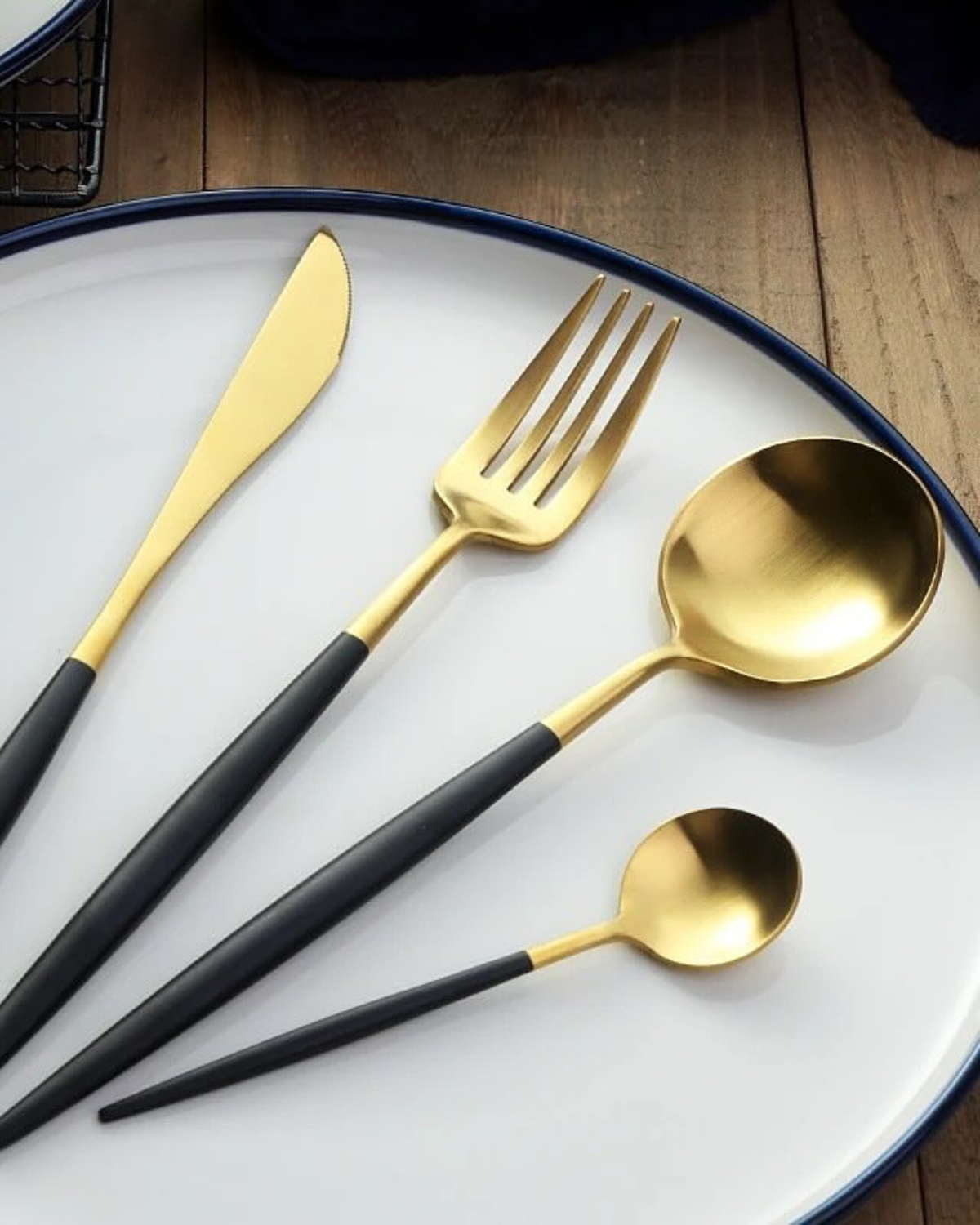 Stainless Steel Cutlery Set with Gold Accents and Matte Black Handles