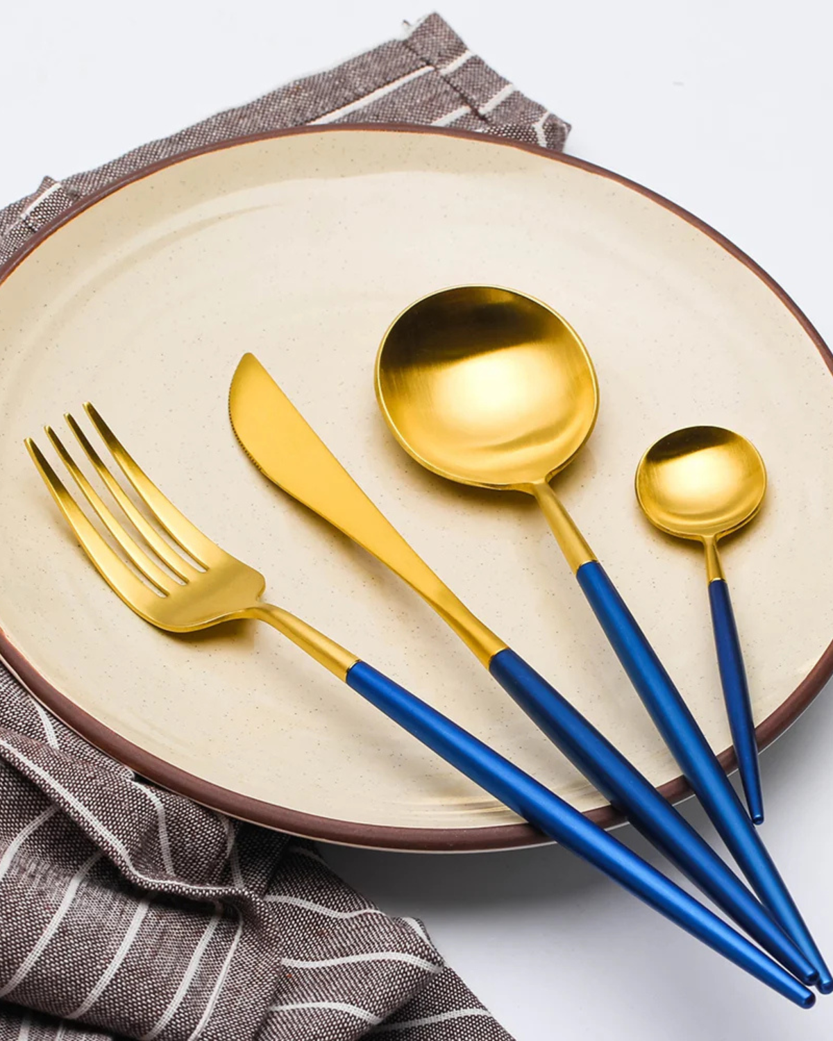 Stainless Steel Cutlery Set with Gold Accents and Matte Black Handles