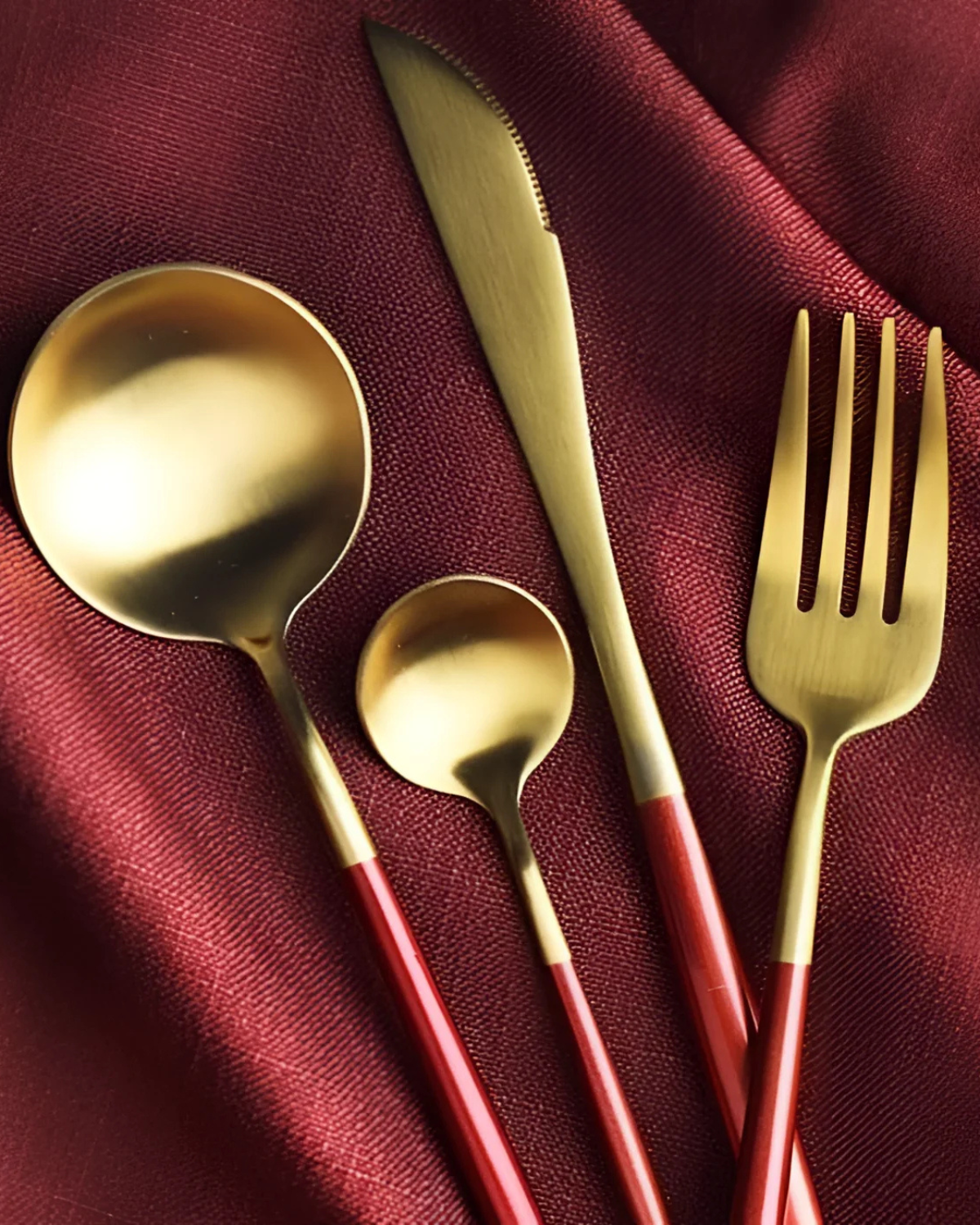 Stainless Steel Cutlery Set with Gold Accents and Matte Black Handles