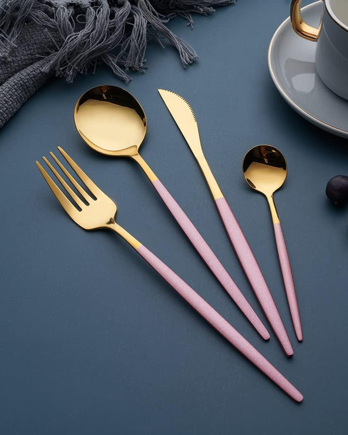 Stainless Steel Cutlery Set with Gold Accents and Matte Black Handles