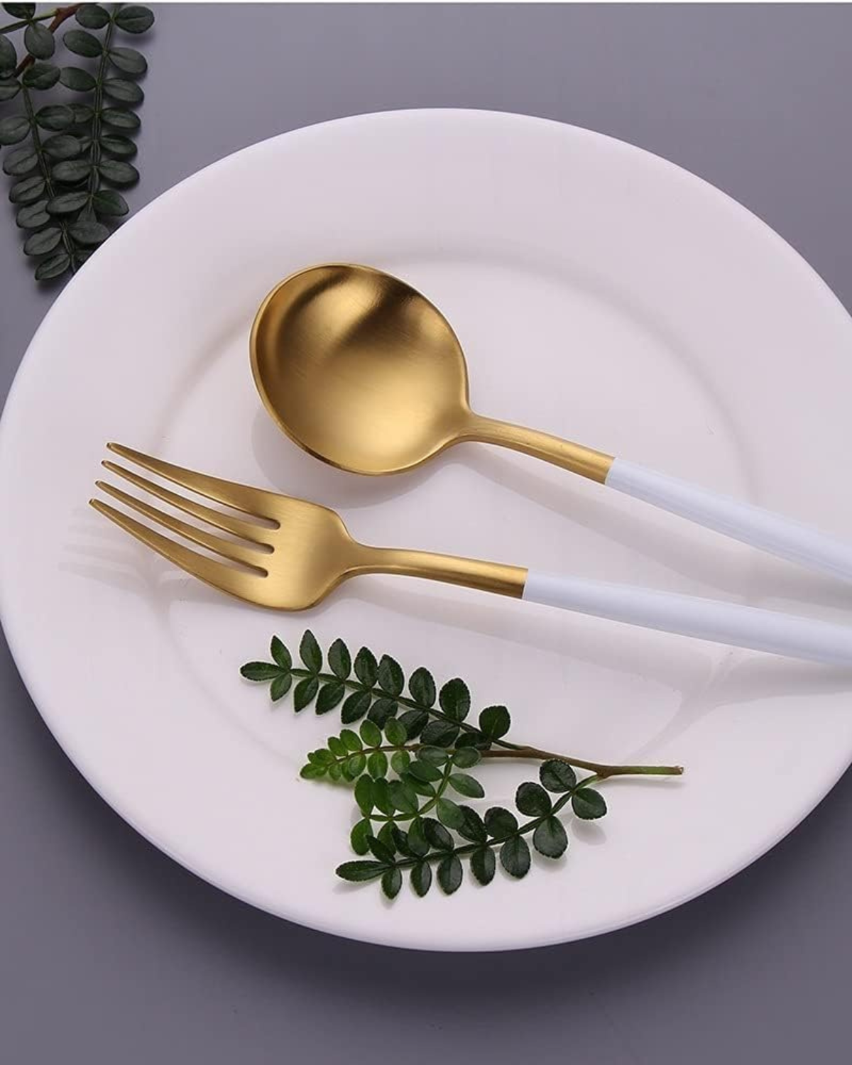 Stainless Steel Cutlery Set with Gold Accents and Matte Black Handles