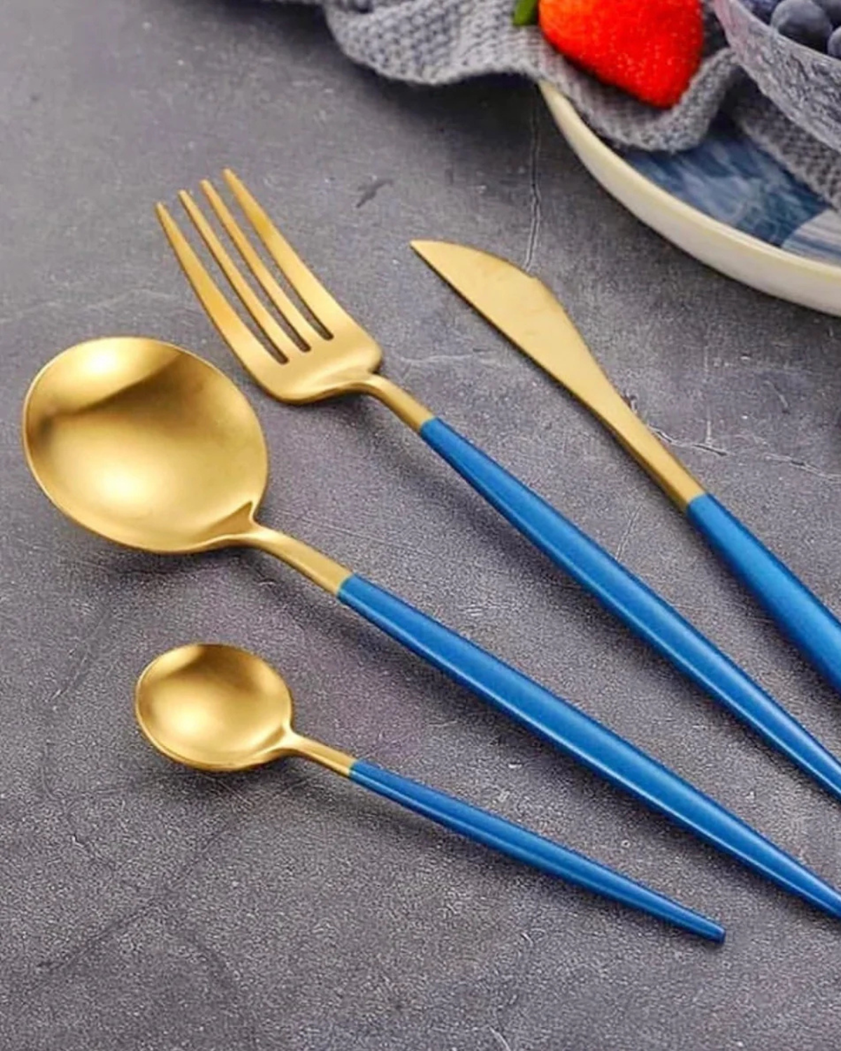 Stainless Steel Cutlery Set with Gold Accents and Matte Black Handles