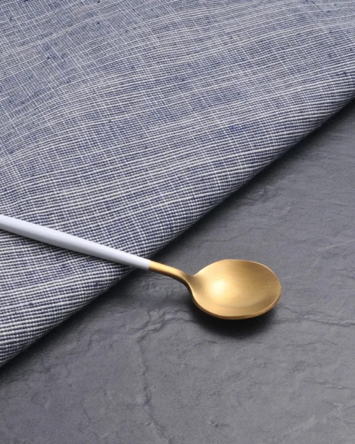 Stainless Steel Cutlery Set with Gold Accents and Matte Black Handles