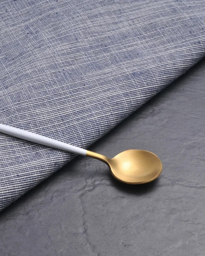 Stainless Steel Cutlery Set with Gold Accents and Matte Black Handles