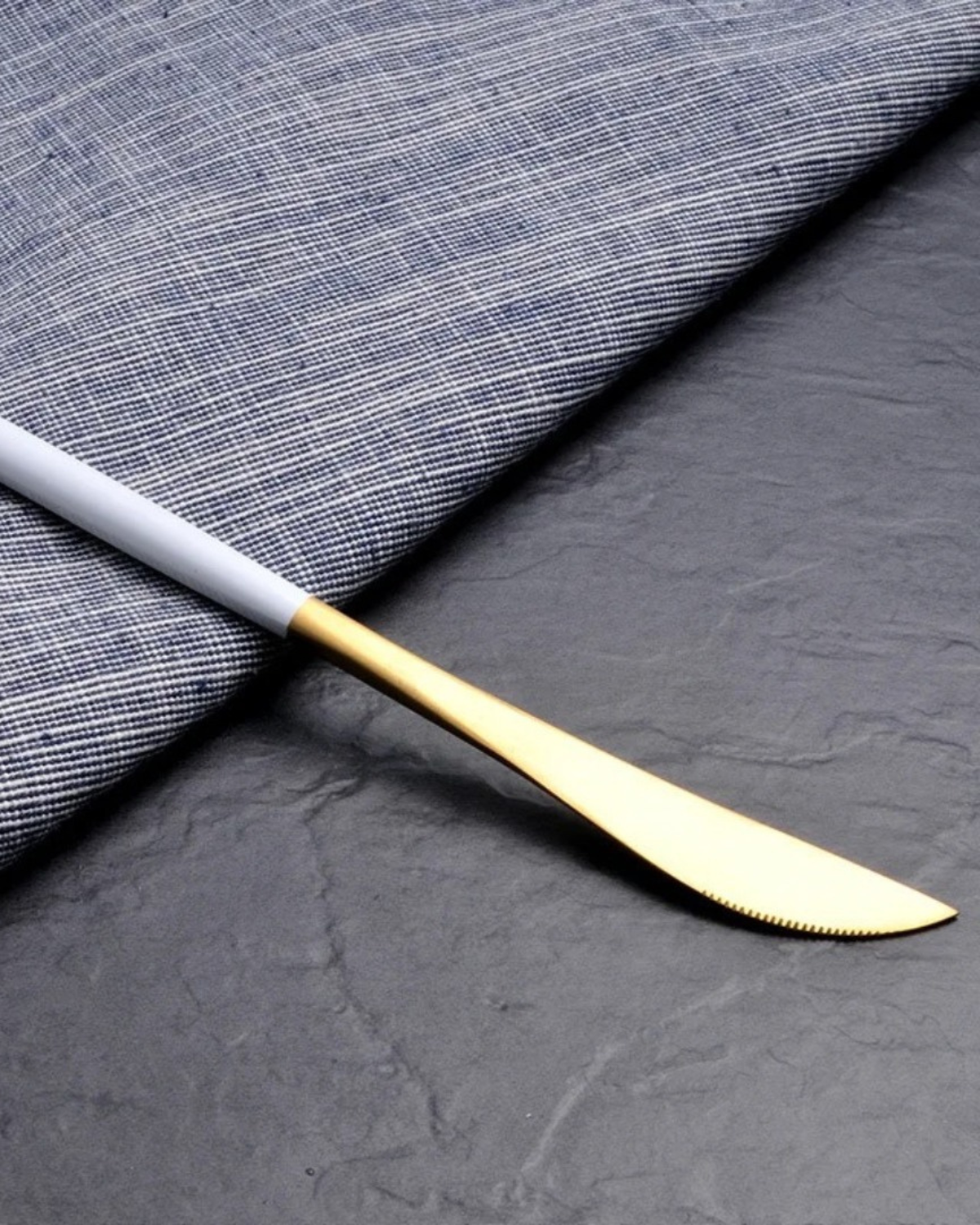 Stainless Steel Cutlery Set with Gold Accents and Matte Black Handles