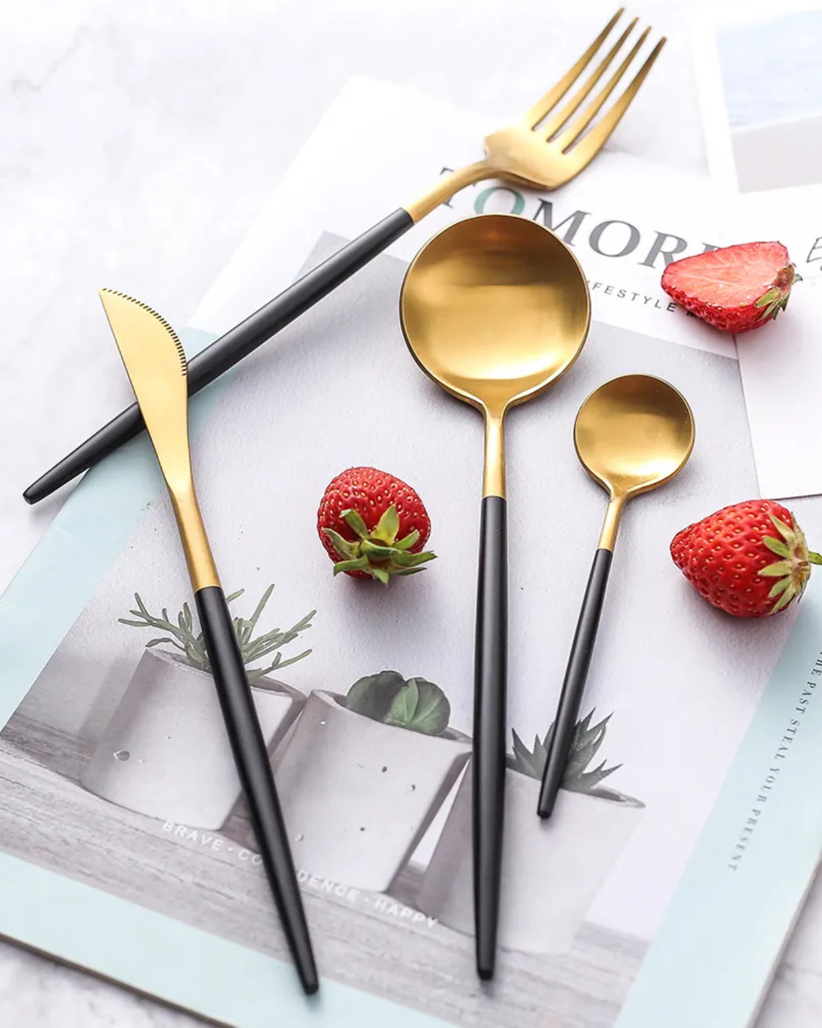 Stainless Steel Cutlery Set with Gold Accents and Matte Black Handles
